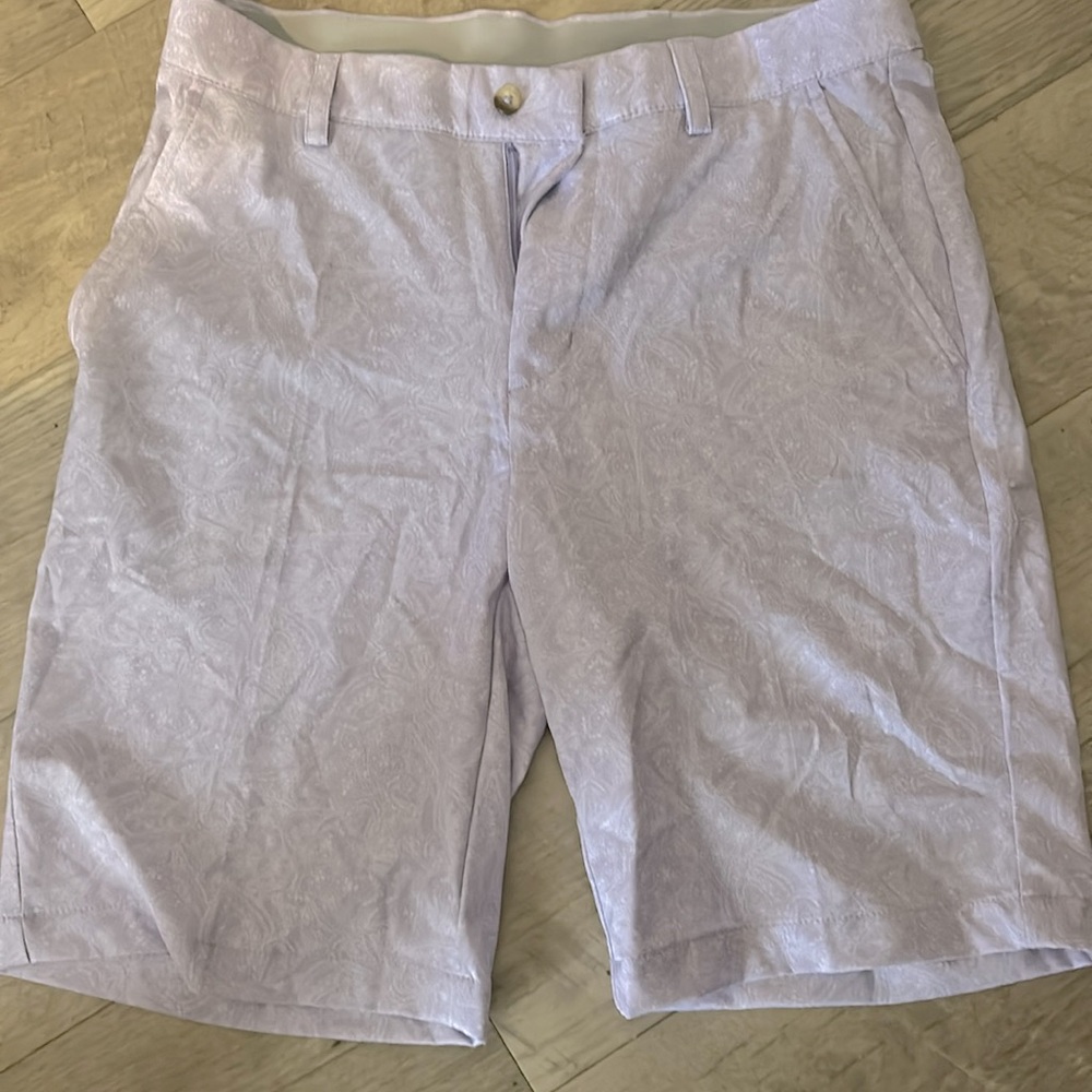 Greg Norman golf shorts. Never worn. Size 32 inseam 9”. Purple with floral print